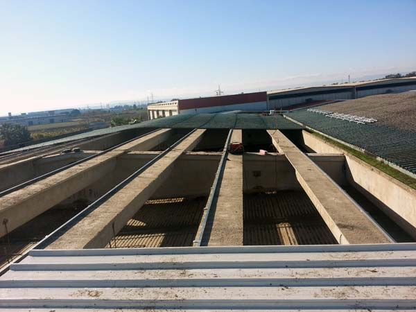 incapsulamento amianto - Rimozione lastre in amianto dalla copertura dell'edificio